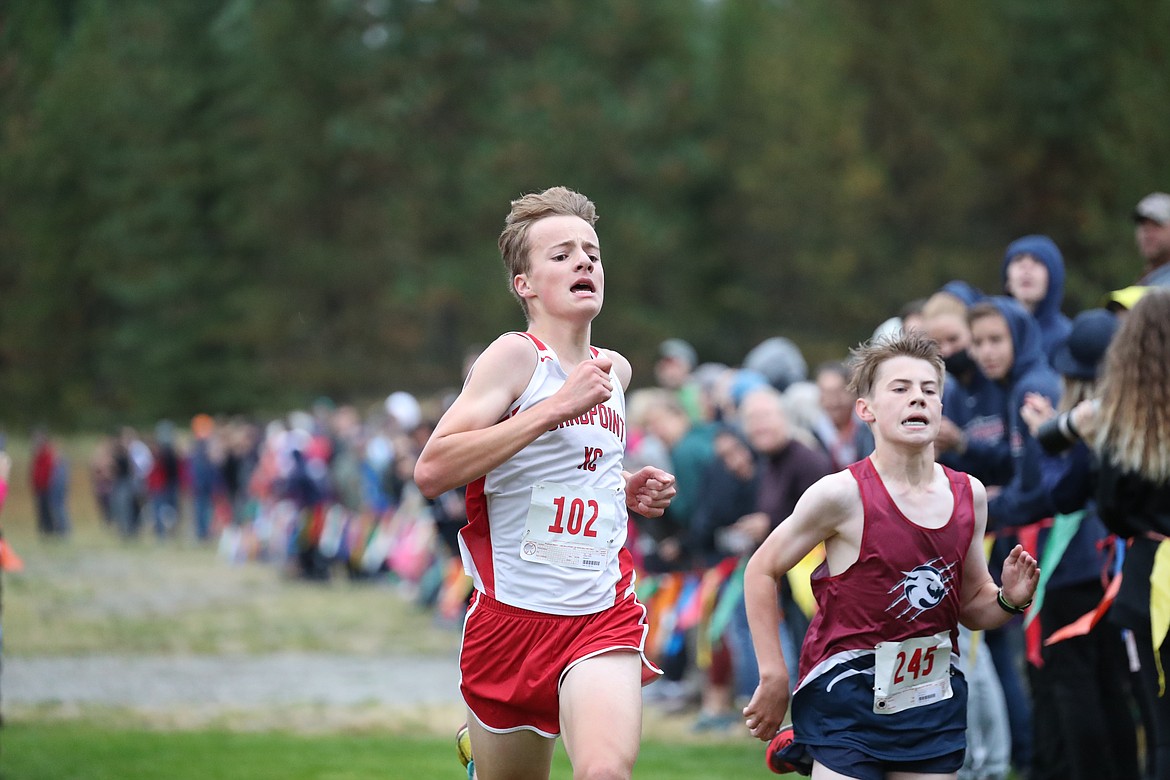 Kasten Grimm finishes the boys JV race.