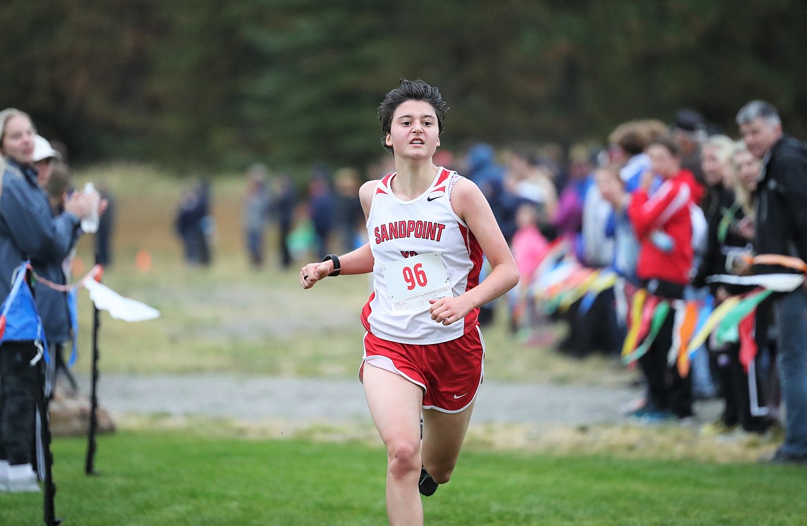 Kora Converse nears the finish of the girls JV race.