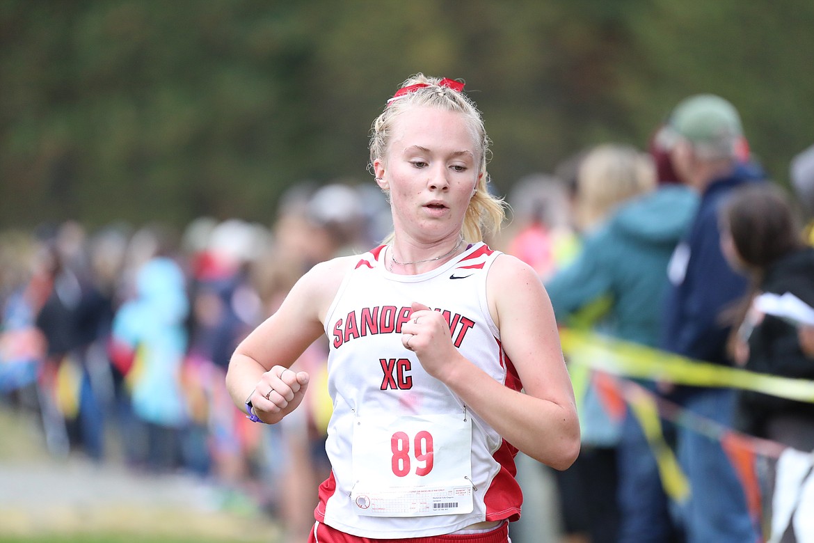 Mackenzie Suhy-Gregoire crosses the finish line on Saturday.