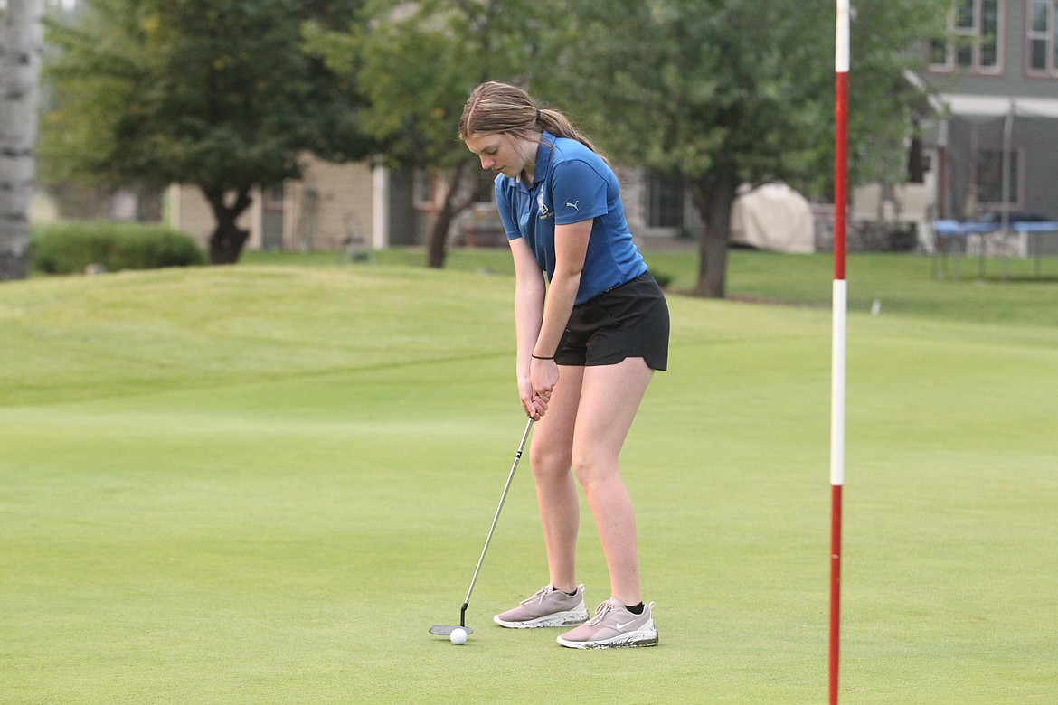 Allie Thorstenson prepares to putt during the Libby Golf Invitational on Sept. 10. (Will Langhorne/The Western News)