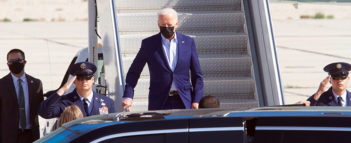 President Joe Biden steps off of Air Force One at the Boise Airport on Monday morning. Biden visited the National Interagency Fire Center to learn more about wildfires in the West.