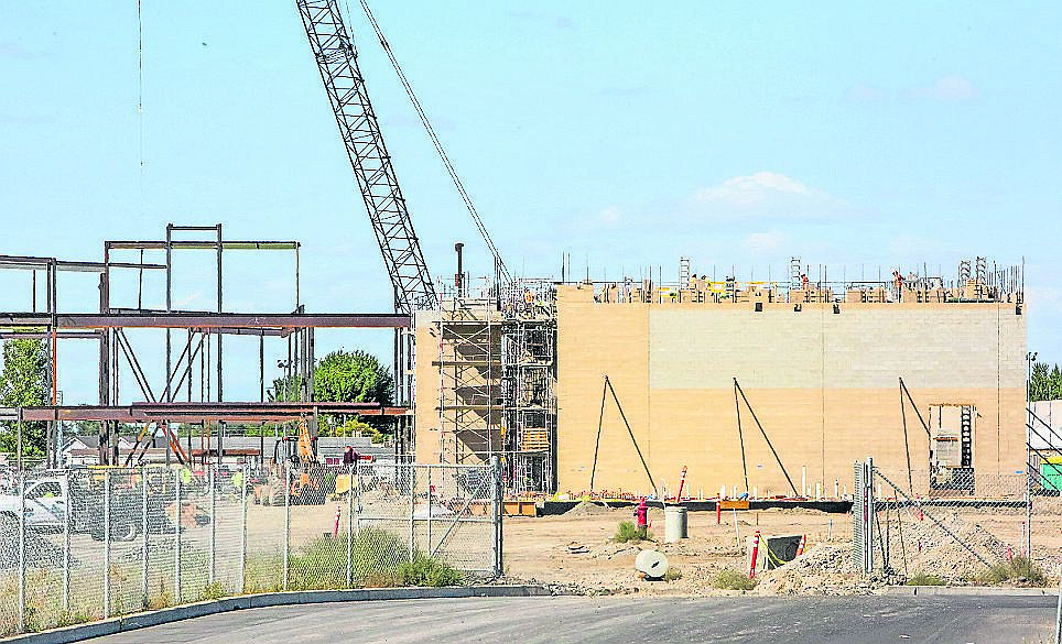 Walls of Moses Lake School District’s new high school rise earlier this month.