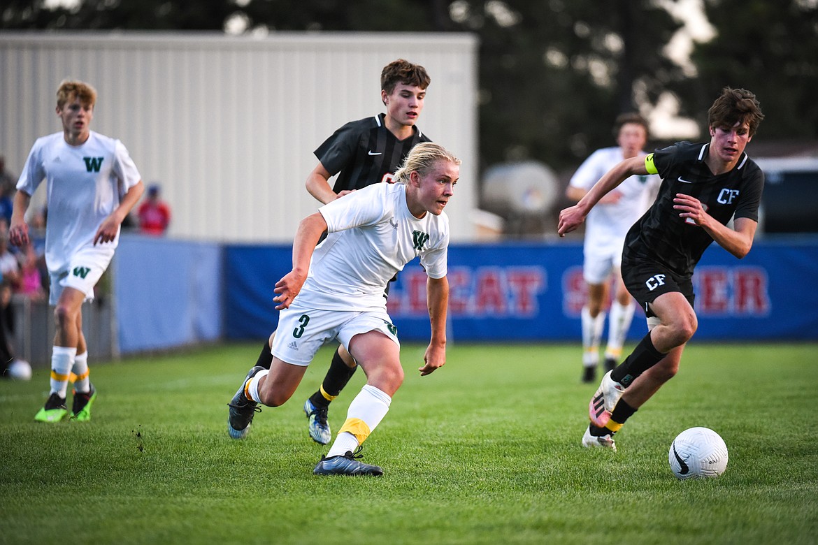 Whitefish's Chase Sabin (3) pushes the ball upfield in the first half against Columbia Falls at Columbia Falls High School on Tuesday, Sept. 14. (Casey Kreider/Daily Inter Lake)