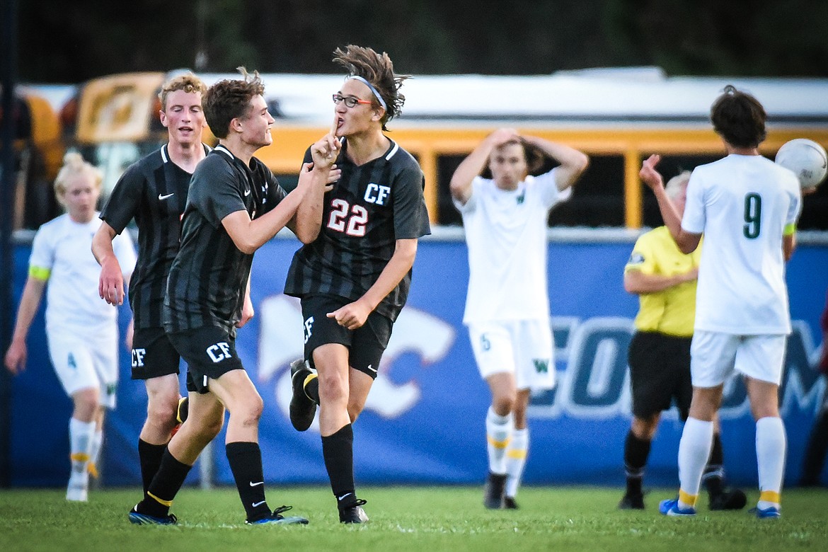 Columbia Falls' Finley Sundberg (22) celebrates after scoring on a penalty kick in the first half against Whitefish at Columbia Falls High School on Tuesday, Sept. 14. (Casey Kreider/Daily Inter Lake)