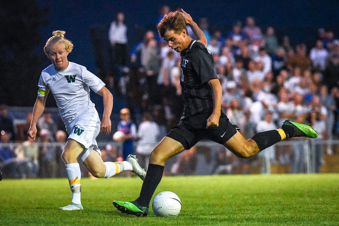 Columbia Falls' Kai Golan (10) has a shot glance off the post in the second half against Whitefish at Columbia Falls High School on Tuesday, Sept. 14. (Casey Kreider/Daily Inter Lake)