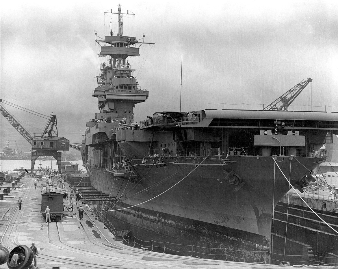 USS Yorktown (CV-5) undergoing repairs after the Coral Sea Battle, in drydock at Pearl Harbor Naval Shipyard, just before the Battle of Midway (1942).