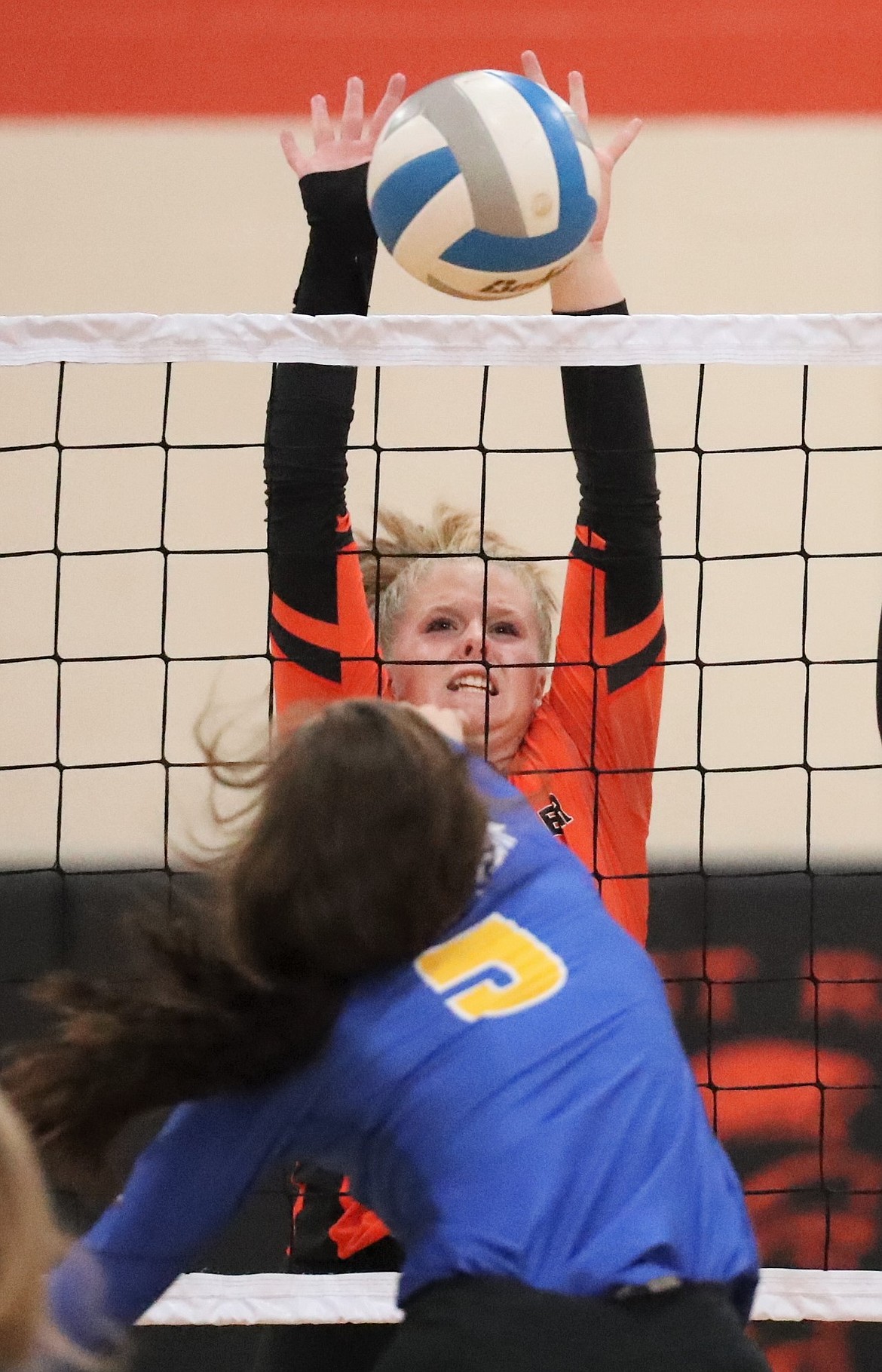 Allyson Barton goes up for a block during Thursday's match against Clark Fork.