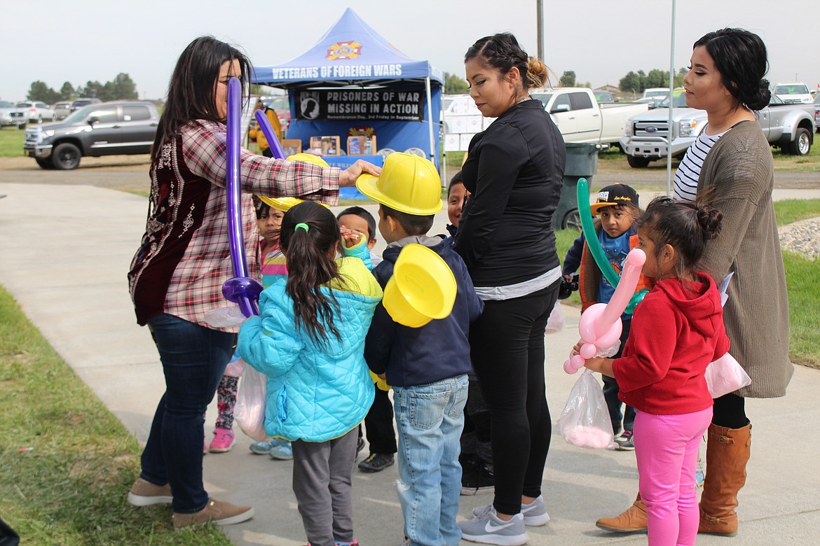 Toy helmets and balloons were among the attractions at the 2019 Othello Fair.