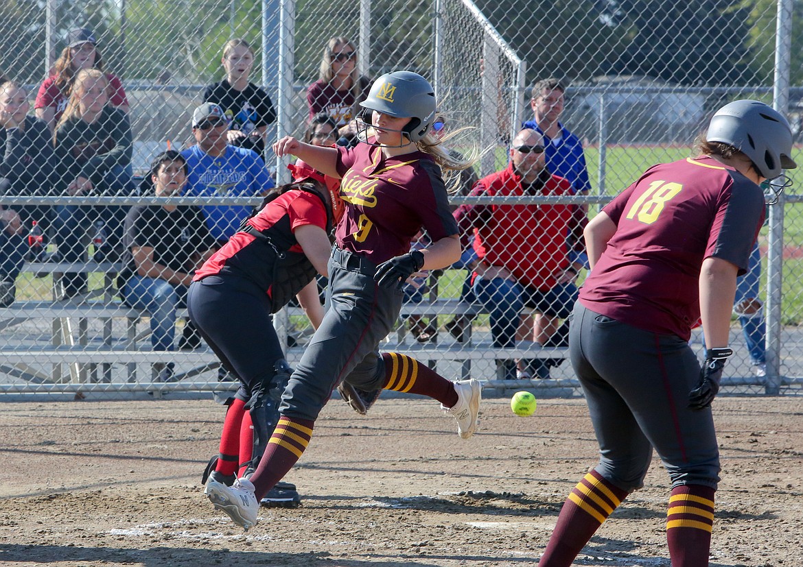 Moses Lake’s Mikayla Schwartz comes across home plate for the in-the-park home run in the first game of the doubleheader against Sunnyside High School Tuesday afternoon in Moses Lake.