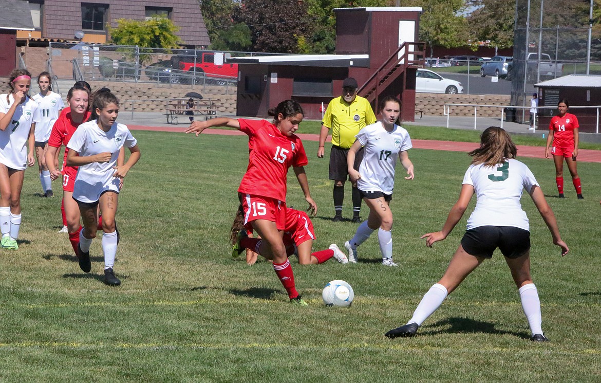 Othello High School’s Stephanie Gonzalez takes a shot from the top of the box in the second half of Saturday’s game.