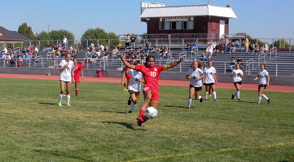 Othello High School’s Janelly Verduzco collects a pass while driving in for a chance to score in the second half on Saturday.
