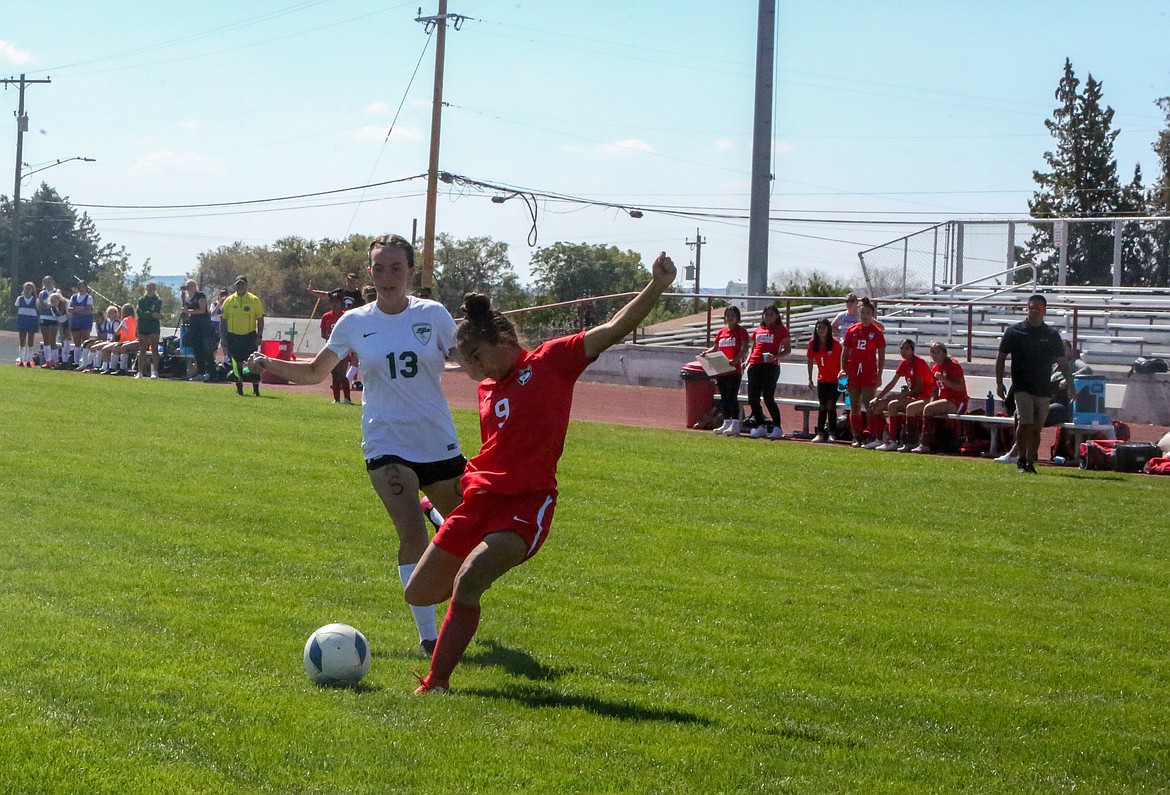 Othello High School’s Bella Garza fires in a shot from outside of the box in the first half on Saturday afternoon against visiting Shadle Park High School.