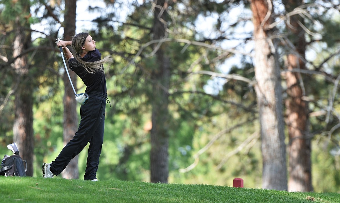 Ronan's Kylee Neimeyer hits a drive on the old course. Neimeyer finished seventh with a 93. (Scot Heisel/Lake County Leader)