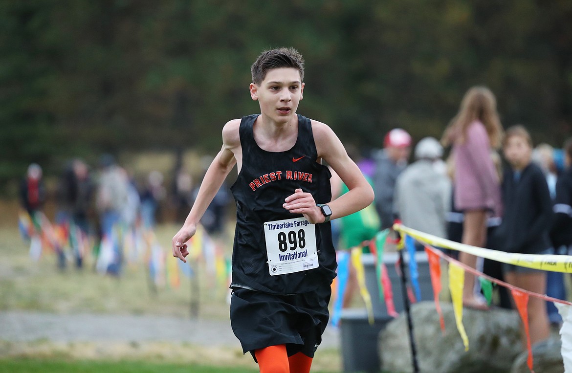 Tanner Bowers nears the finish of Saturday's Timberlake Farragut Invitational.