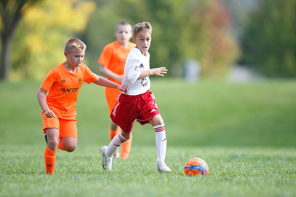 Photo courtesy BUSCEMA PHOTOGRAPHY
The Timbers North FC 11 Boys soccer team played host to 90+ Project B11 Hartanov/Valdez from Spokane on Saturday, but came up short of the win. The Timbers' goal was scored by Ryder Quinn (pictured, in white). Nolan Rice and Damon Mysse had multiple saves at goalkeeper. The Timbers travel to Sandpoint this weekend to play in the Pend Oreille Cup.