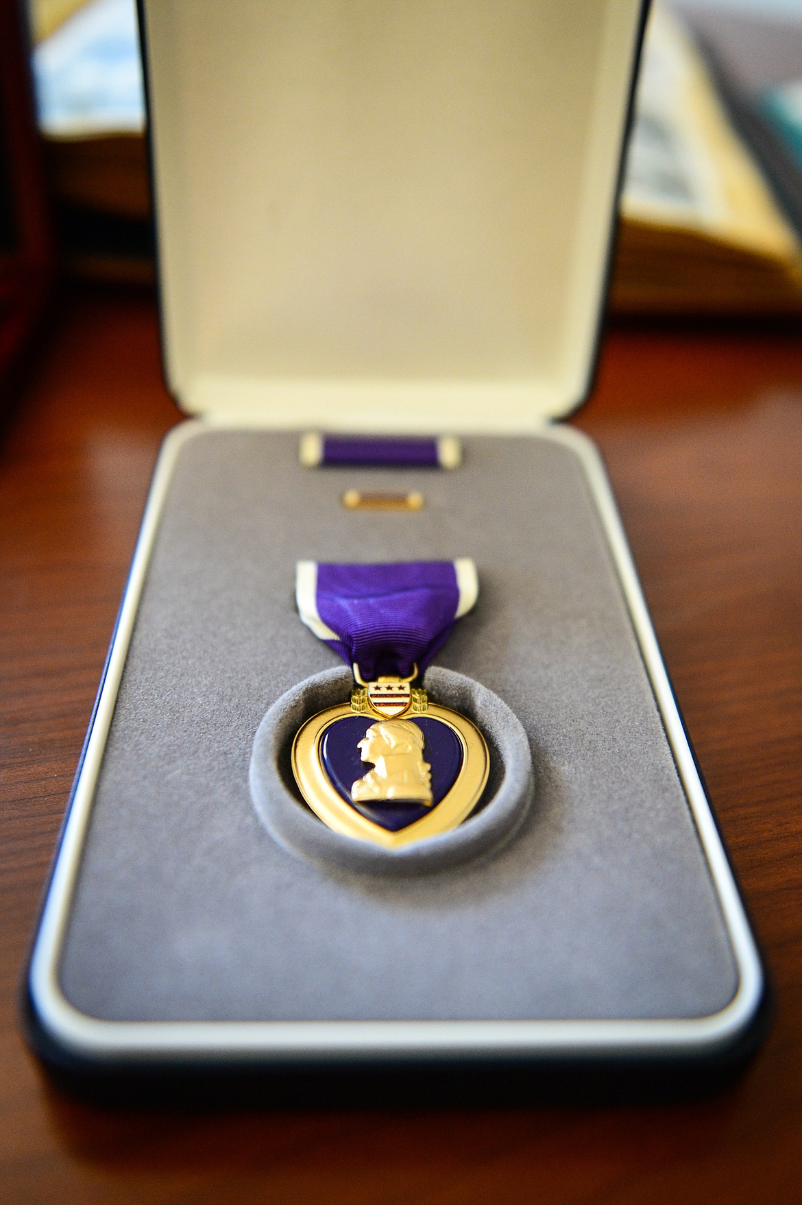 Montana Gov. Greg Gianforte presented this Purple Heart to the family of U.S. Army 2nd Lt. John "Jack" Mulder, a World War II soldier who went missing after a battle in Germany five days after his son's birth in November 1944. (Casey Kreider/Daily Inter Lake)