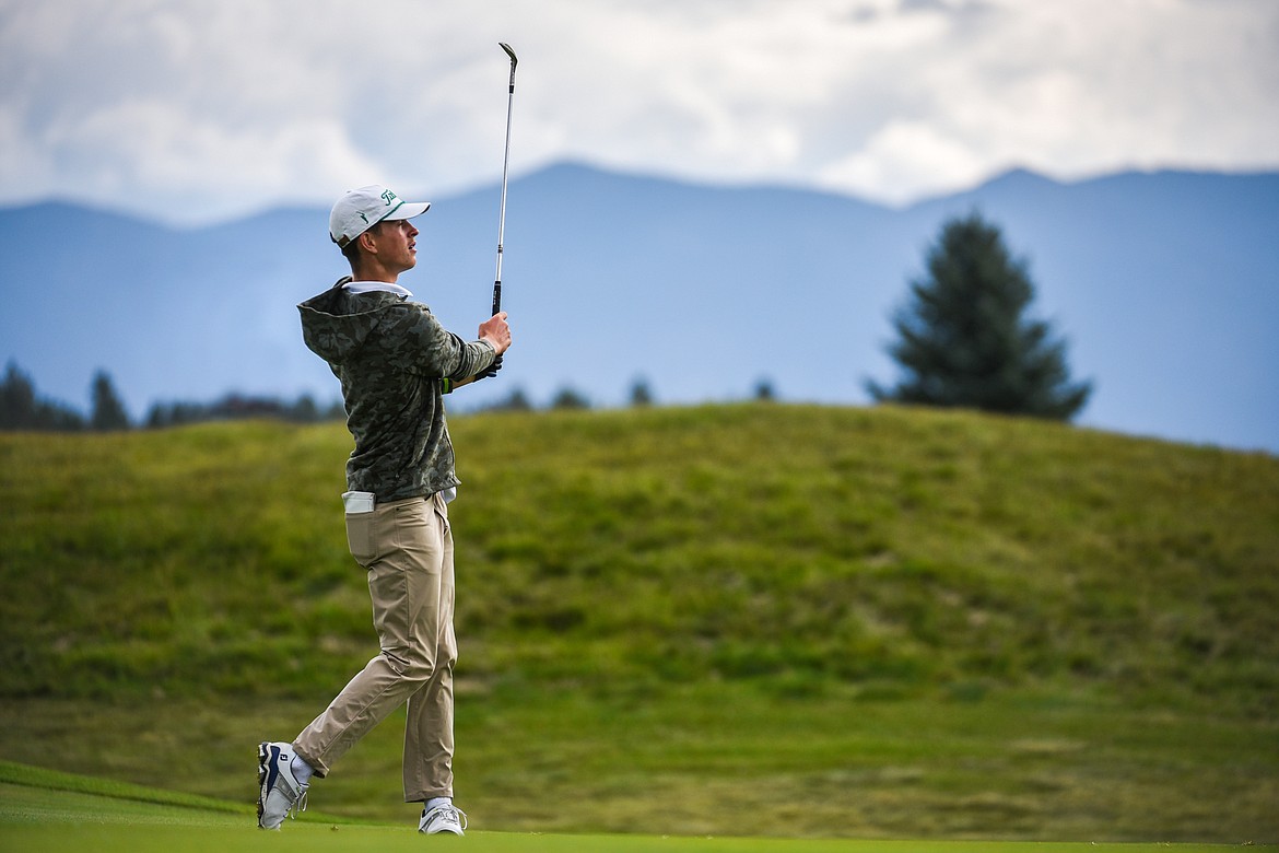 Glacier's Tyler Avery watches his approach shot on the 12th hole at Northern Pines Golf Club during the Kalispell Invite on Wednesday, Sept. 15. (Casey Kreider/Daily Inter Lake)