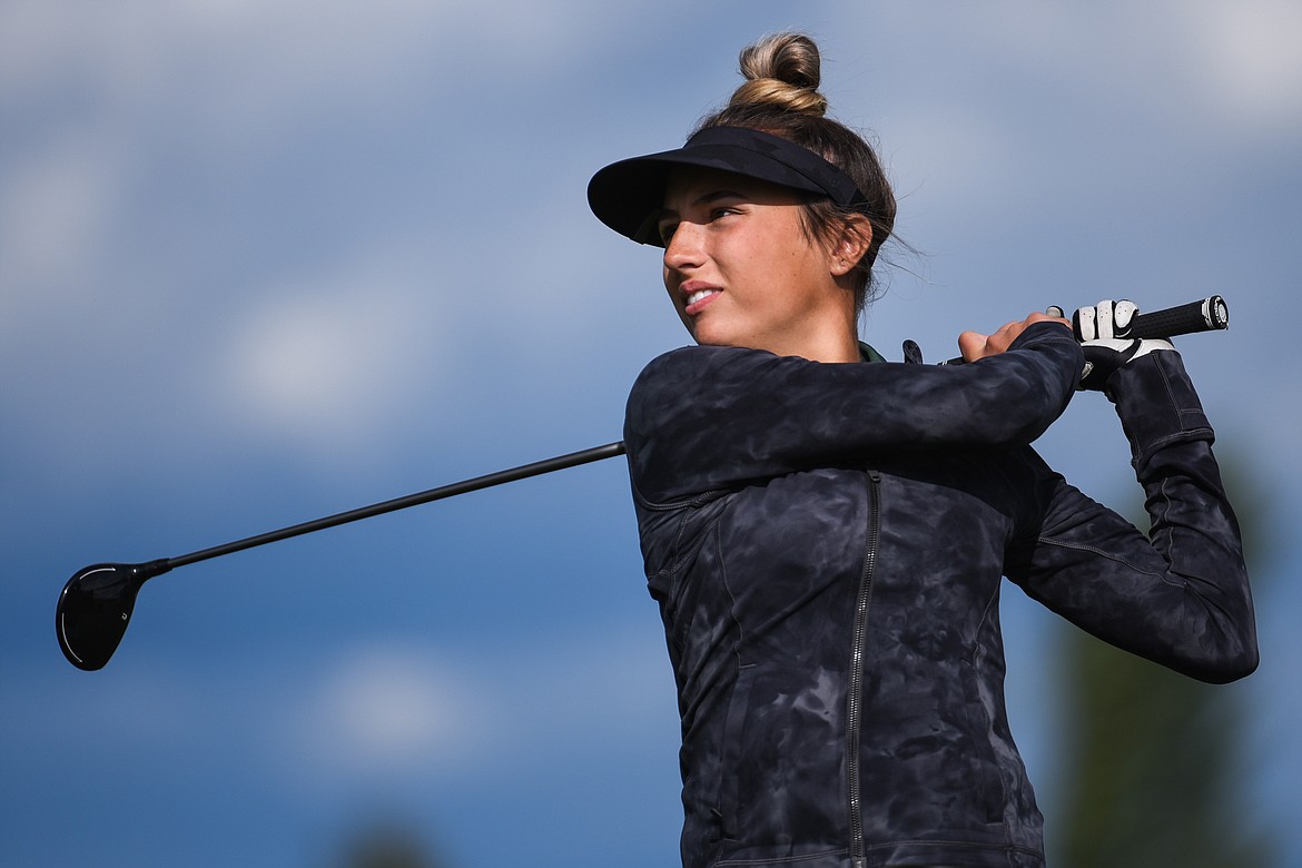 Glacier's Stella Claridge watches her drive on the fifth hole at Northern Pines Golf Club during the Kalispell Invite on Wednesday, Sept. 15. (Casey Kreider/Daily Inter Lake)