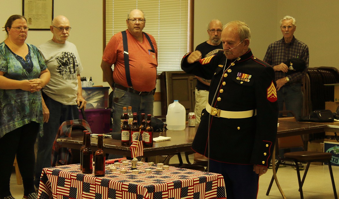 (Photo by Victor Corral Martinez)
Pat Lenard paying respect and saluting the fallen 13.