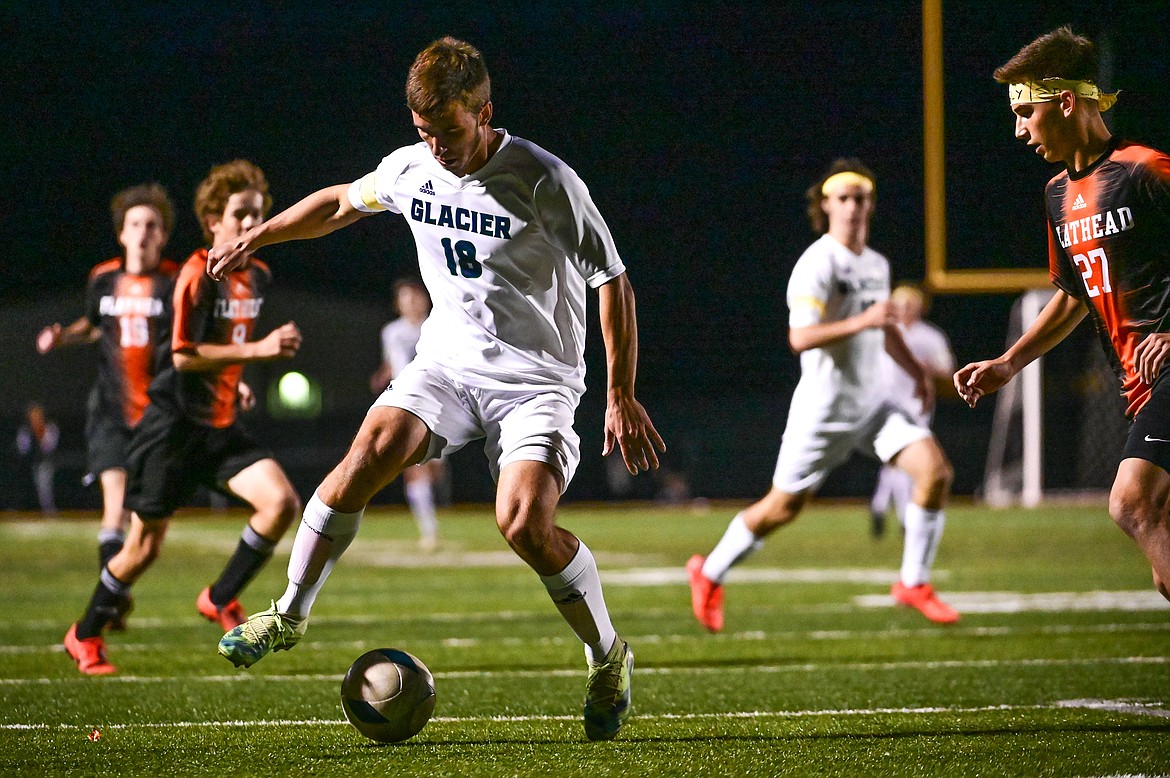 Glacier's Jake Ritzdorf (18) pushes the ball upfield in the first half against Flathead at Legends Stadium on Thursday, Sept. 16. (Casey Kreider/Daily Inter Lake)