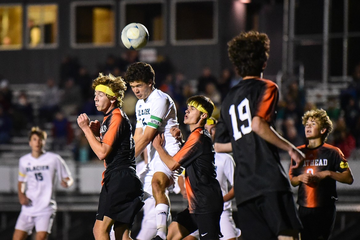 Glacier's Elijah Mildren (14) fights for a header off a corner kick against Flathead defenders in the first half at Legends Stadium on Thursday, Sept. 16. (Casey Kreider/Daily Inter Lake)