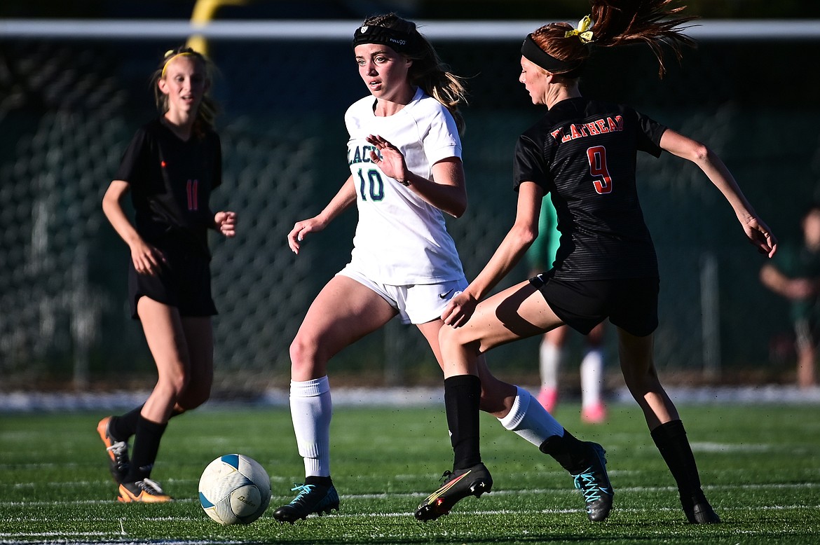 Glacier's Piper Buzzell (10) pushes the ball upfield in the first half against Flathead at Legends Stadium on Thursday, Sept. 16. (Casey Kreider/Daily Inter Lake)