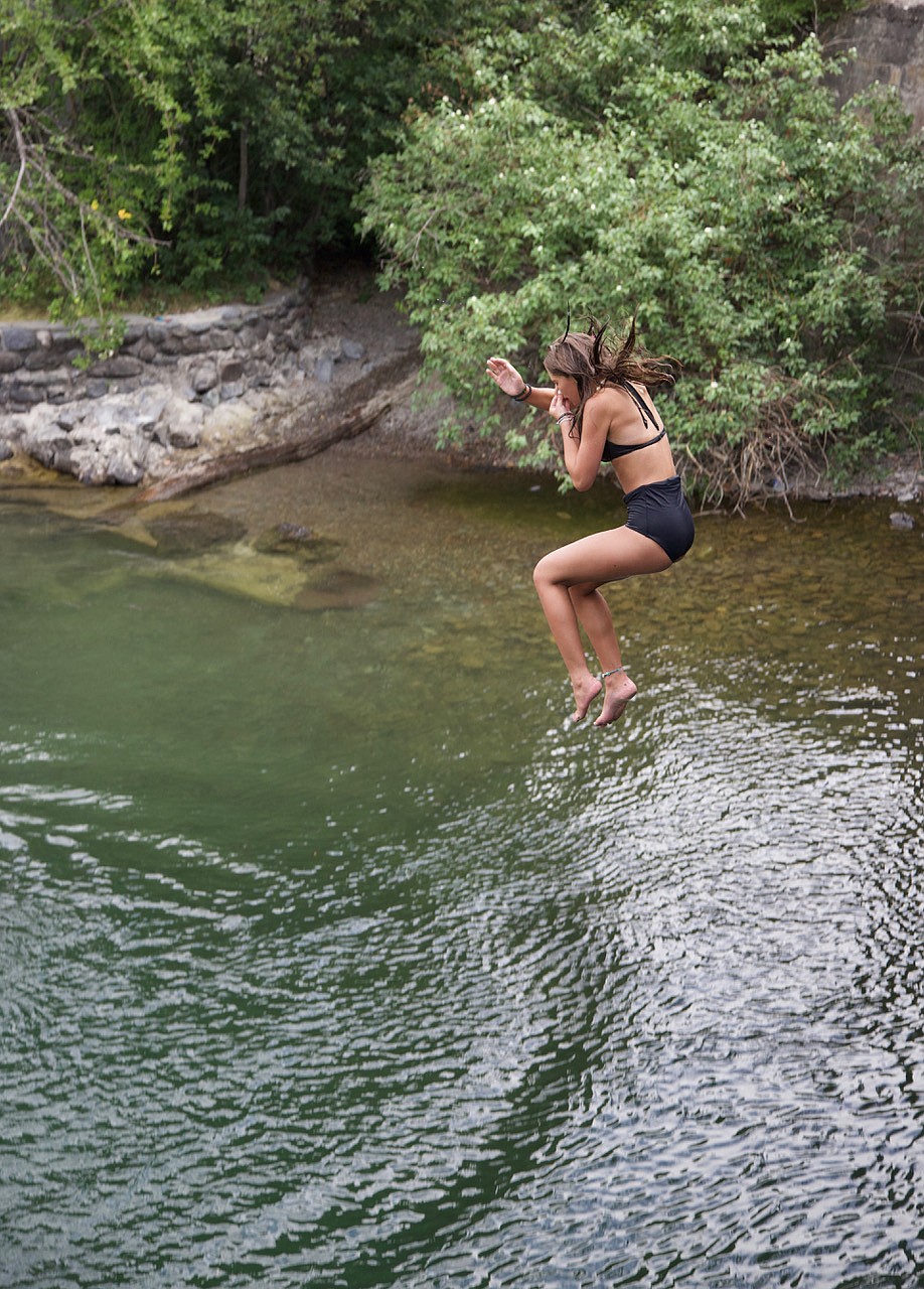 Bridge jumping is exhilarating activity especially for the young at the one-lane bridge in Bigfork.