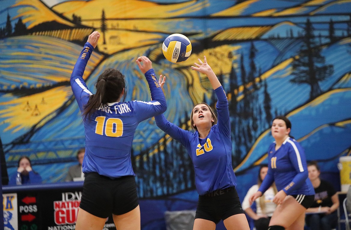 Paige Valliere sets the ball for a teammate on Thursday.