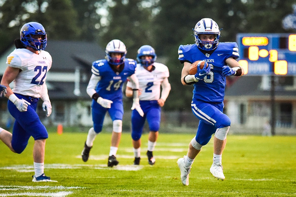 Columbia Falls wide receiver Mark Robison (6) takes a reception to the end zone in the first quarter against Libby  at Satterthwaite Field on Friday, Sept. 17. (Casey Kreider/Daily Inter Lake)