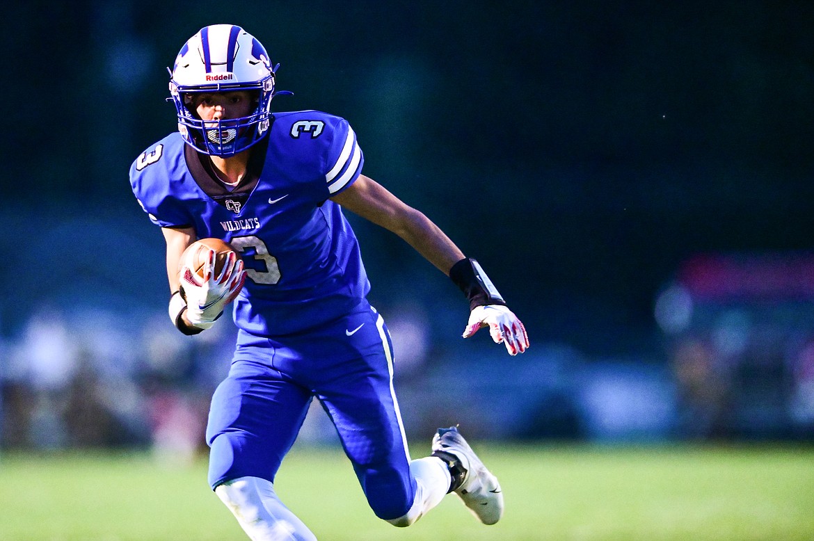 Columbia Falls wide receiver Jace Duval (3) picks up yardage after a reception in the second quarter against Libby at Satterthwaite Field on Friday, Sept. 17. (Casey Kreider/Daily Inter Lake)