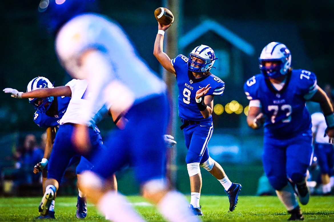 Columbia Falls quarterback Cody Schweikert (9) looks to pass in the first quarter against Libby at Satterthwaite Field on Friday, Sept. 17. (Casey Kreider/Daily Inter Lake)