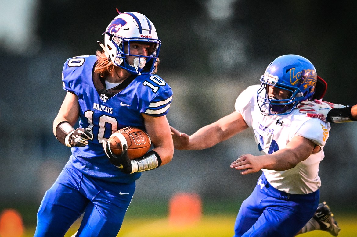 Columbia Falls wide receiver Cade Morgan (10) picks up yardage after a reception in the first quarter against Libby at Satterthwaite Field on Friday, Sept. 17. (Casey Kreider/Daily Inter Lake)