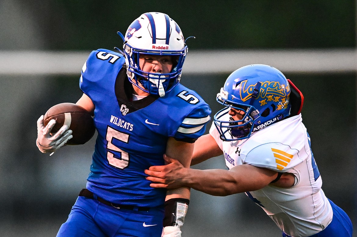 Columbia Falls' Isaiah Roth (5) returns a punt for a touchdown in the first quarter against Libby at Satterthwaite Field on Friday, Sept. 17. (Casey Kreider/Daily Inter Lake)