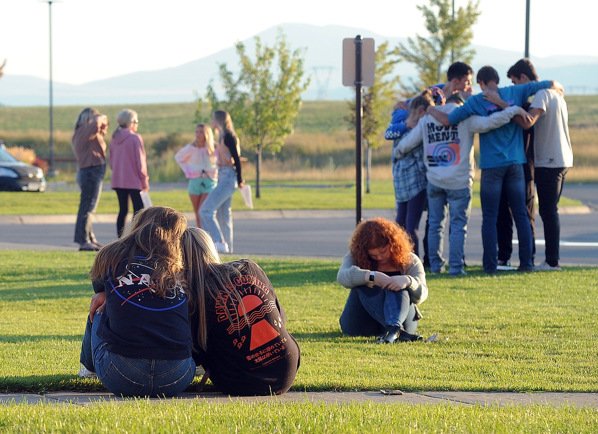 PEOPLE gather at Glacier High School on Monday, Sept. 13, 2021, for an evening of music, song, prayer and remembrance following the recent suicide deaths of Glacier and Flathead high school students. If you’re feeling suicidal, talk to someone. Call the National Suicide Prevention Lifeline at 1-800-273-8255. (Hilary Matheson/Daily Inter Lake)