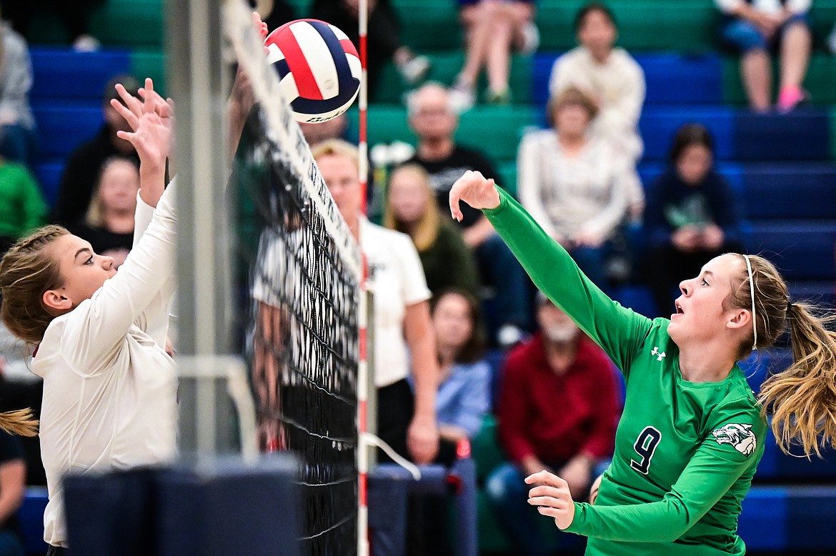 Glacier's Sarah Downs (9) goes up for a kill against Helena at Glacier High School on Saturday, Sept. 18. (Casey Kreider/Daily Inter Lake)