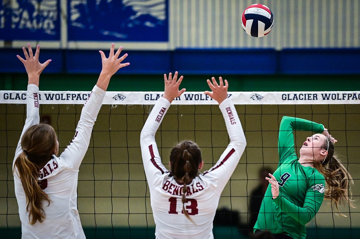 Glacier's Sarah Downs (9) goes up for a kill against Helena at Glacier High School on Saturday, Sept. 18. (Casey Kreider/Daily Inter Lake)