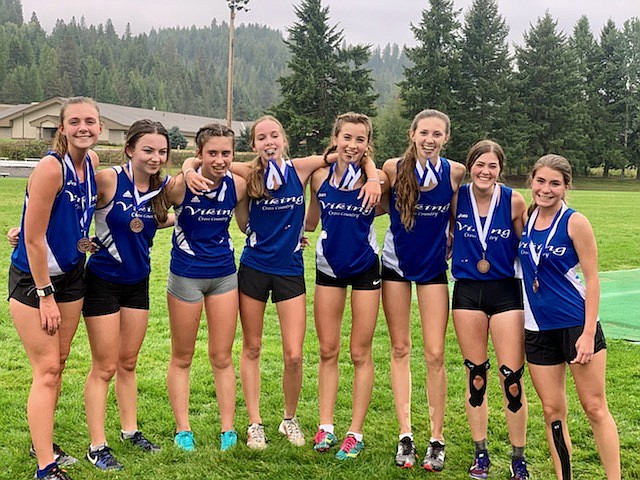 Courtesy photo
The Coeur d'Alene High girls cross country team won the Bonners Ferry Invitational on Saturday. Viking runners finished in places 2-9. From left are Abby Buzolich, Georgia May, Zara Munyer, Anne Marie Dance, ElliAna Rietze, Kim Priebe, Gracie Averill and Riley Yake.