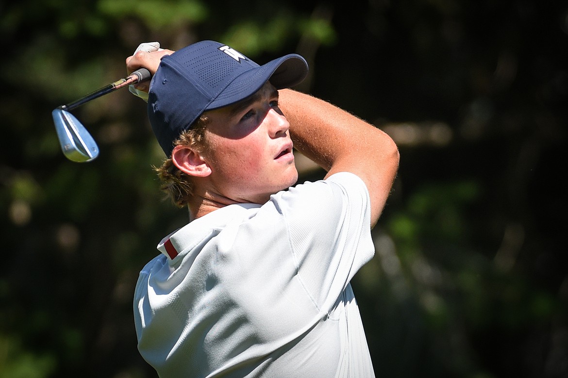 Will Salonen watches his tee shot on the 16th hole of the South Course  during the opening round of the Earl Hunt 4th of July Tournament at Whitefish Lake Golf Club on Thursday, July 1. (Casey Kreider/Daily Inter Lake)