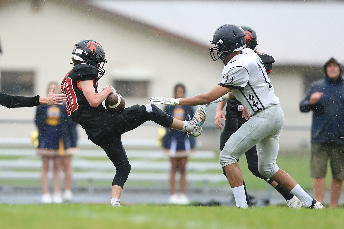 Senior Conor Berns secures a catch during Saturday's game against Oroville.