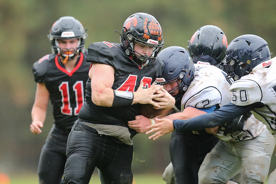 Senior running back Kameron Salesky carries the ball through the heart of the Oroville defense on Saturday.