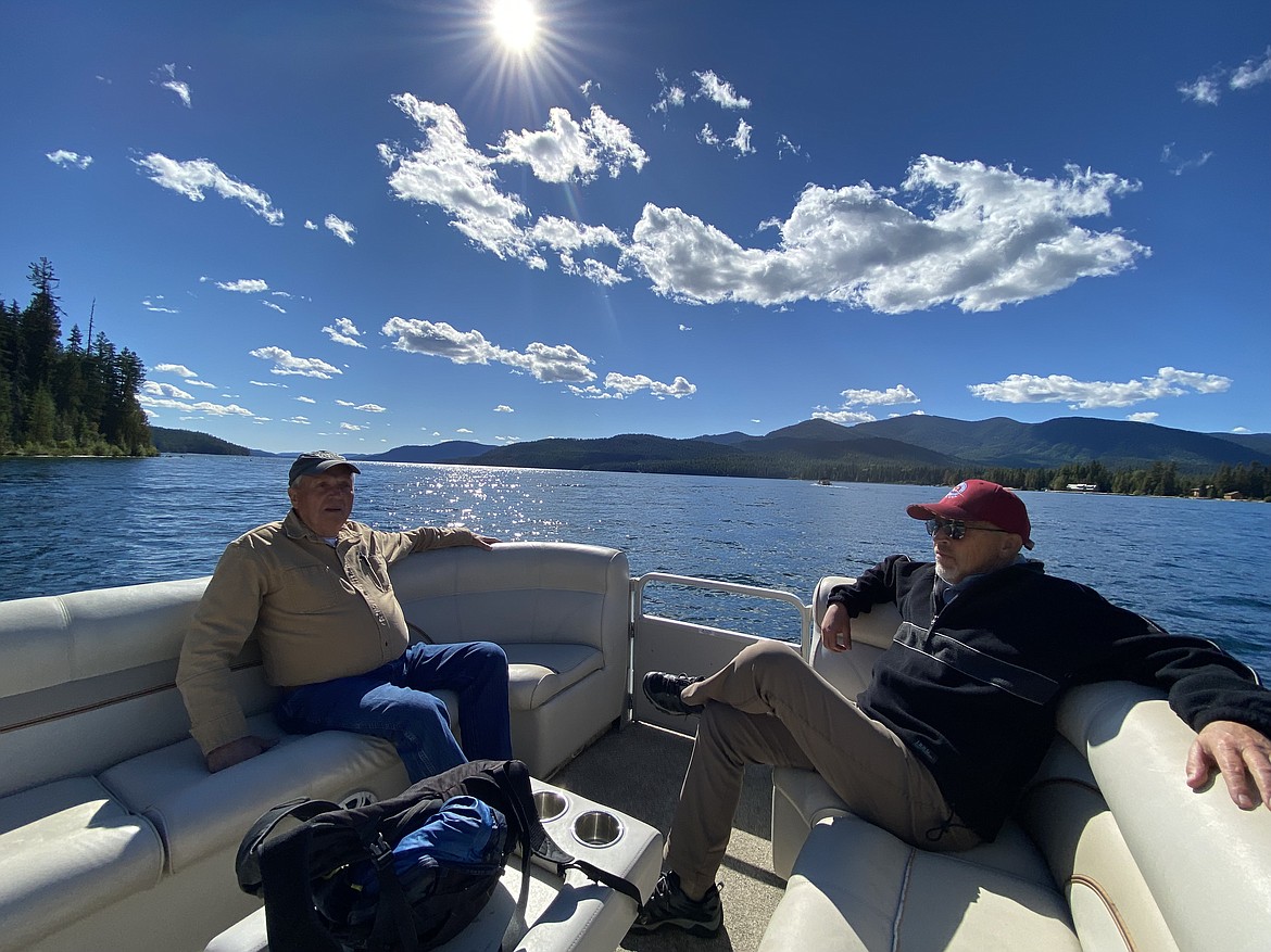 Dale Van Stone, Idaho Water Resource Board member from Hope, chats with State Senator Steve Vick on a gorgeous afternoon on Priest Lake near the new Breakwater structure and Thorofare channel.