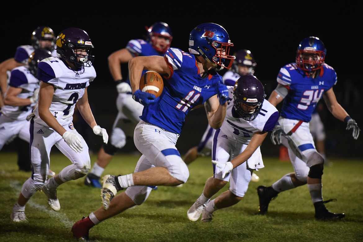 Viking George Bucklin outruns the Jefferson defense on his way to a 46-yard touchdown in the fourth quarter Friday. (Jeremy Weber/Bigfork Eagle)