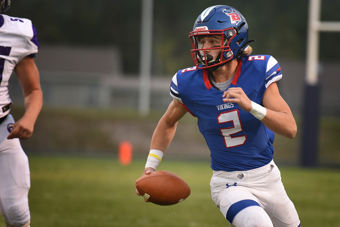 Bigfork quarterback Patrick Wallen looks for an open receiver in the first quarter against Jefferson Friday. (Jeremy Weber/Bigfork Eagle)