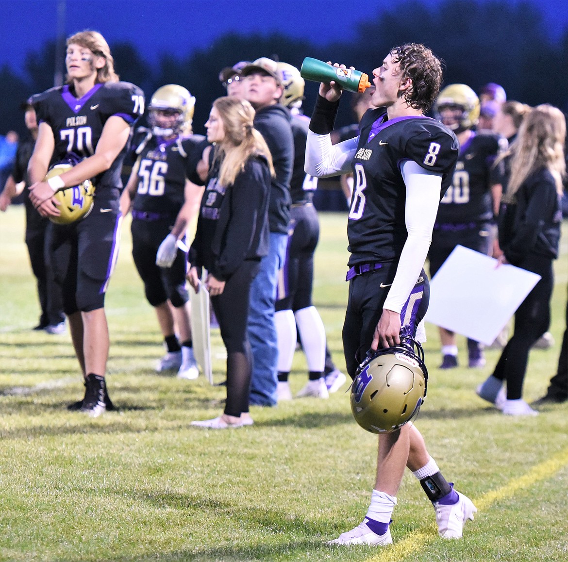 Jarrett Wilson takes a break on the sideline during the Pirates' win over Ronan. (Scot Heisel/Lake County Leader)