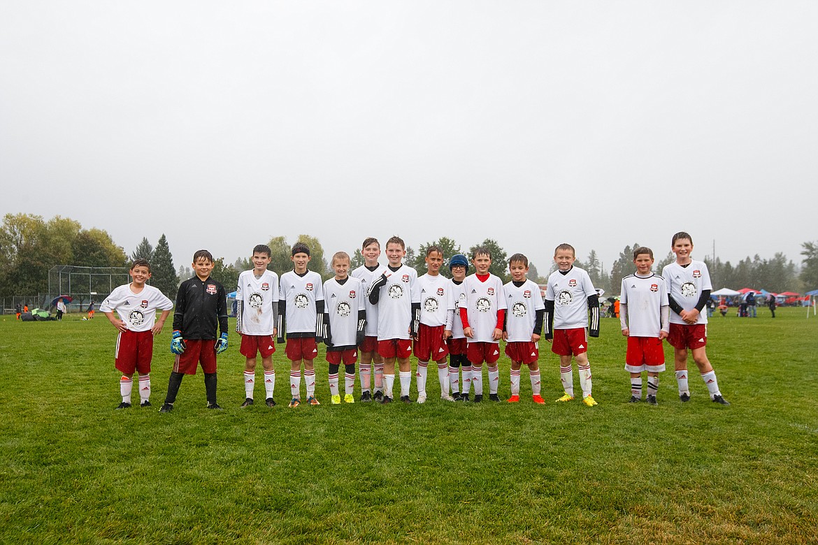 Photo courtesy BUSCEMA PHOTOGRAPHY
The Timbers North FC 11 Boys soccer team traveled to Sandpoint this past weekend to compete in the Pend Oreille Cup. The team fought through heavy rain on Saturday competing against FC Spokane and 90+ Project, playing their final game on Sunday against Flathead Valley. Timbers goals were scored by Charlie McVey and Ryder Quinn. From left are Ryder Benca, Nolan Rice, Damon Mysse, Lucas Buscema, Bode Barton, Landon Smith, Asher Smith, Ryder Quinn, Kolby Johnson, Oliver Peters, Charlie McVey, Eli Nail, Owen Newby and Maxim Lopez. Not pictured is coach Mark Plakorus.