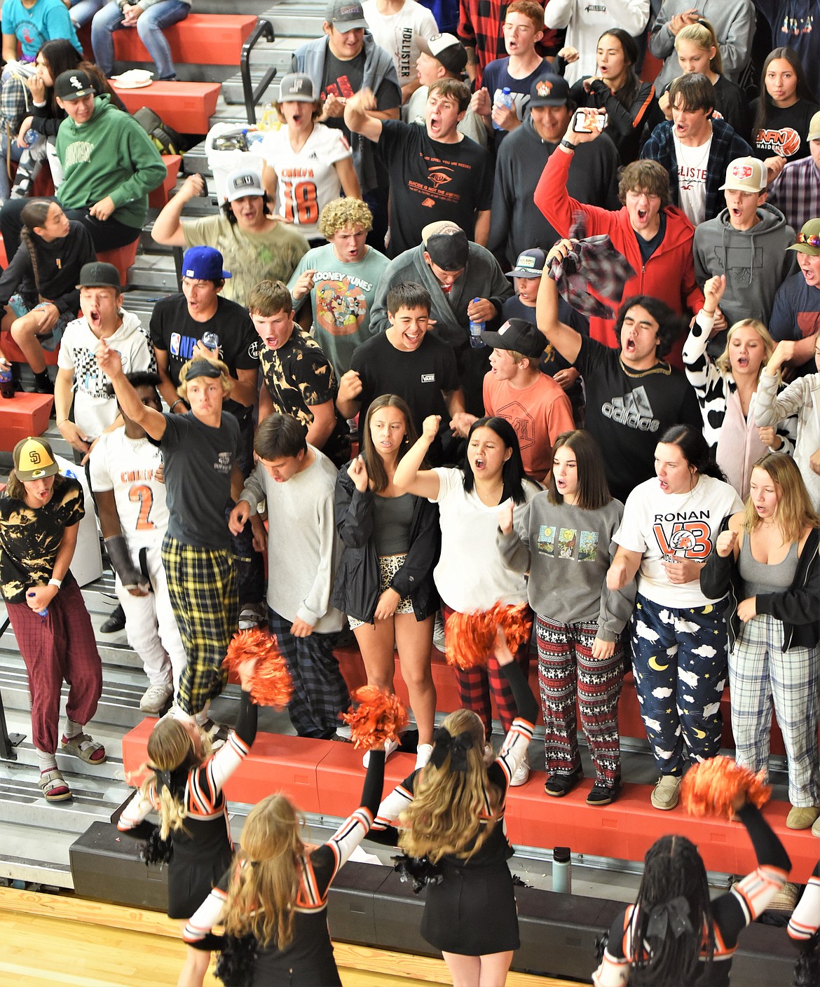 Ronan's student section rallies its team in a volleyball match against Polson on Thursday. (Scot Heisel/Lake County Leader)