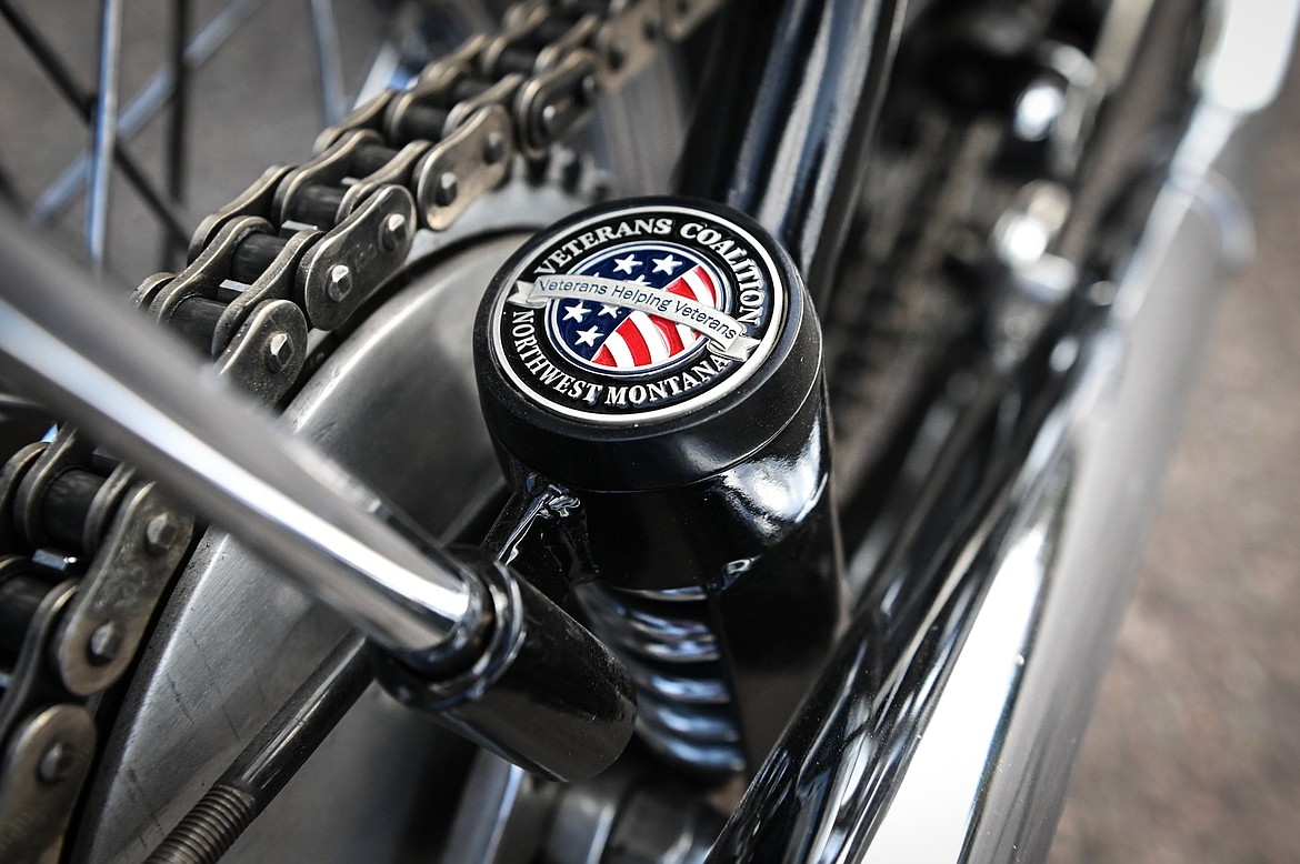 A Veterans Coalition of Northwest Montana challenge coin on a custom 1972 Harley Davidson Ironhead motorcycle built by Jeff Peterson of Bodhisattva Cycles. The Coalition held a fundraiser to raise money for a Question, Persuade and Refer suicide awareness program for veterans and Nate Gebhart, of Kalispell, was the winner of the bike.