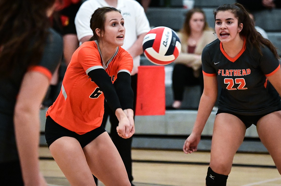 Flathead's Cyan Mooney (6) bumps to a teammate against Missoula Hellgate at Flathead High School on Thursday, Sept. 23. (Casey Kreider/Daily Inter Lake)