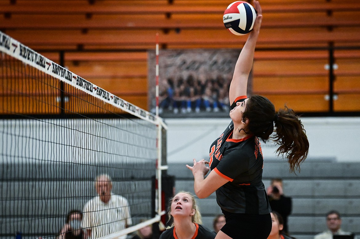 Flathead's Savanna Sterck (23) goes up for a kill against Missoula Hellgate at Flathead High School on Thursday, Sept. 23. (Casey Kreider/Daily Inter Lake)