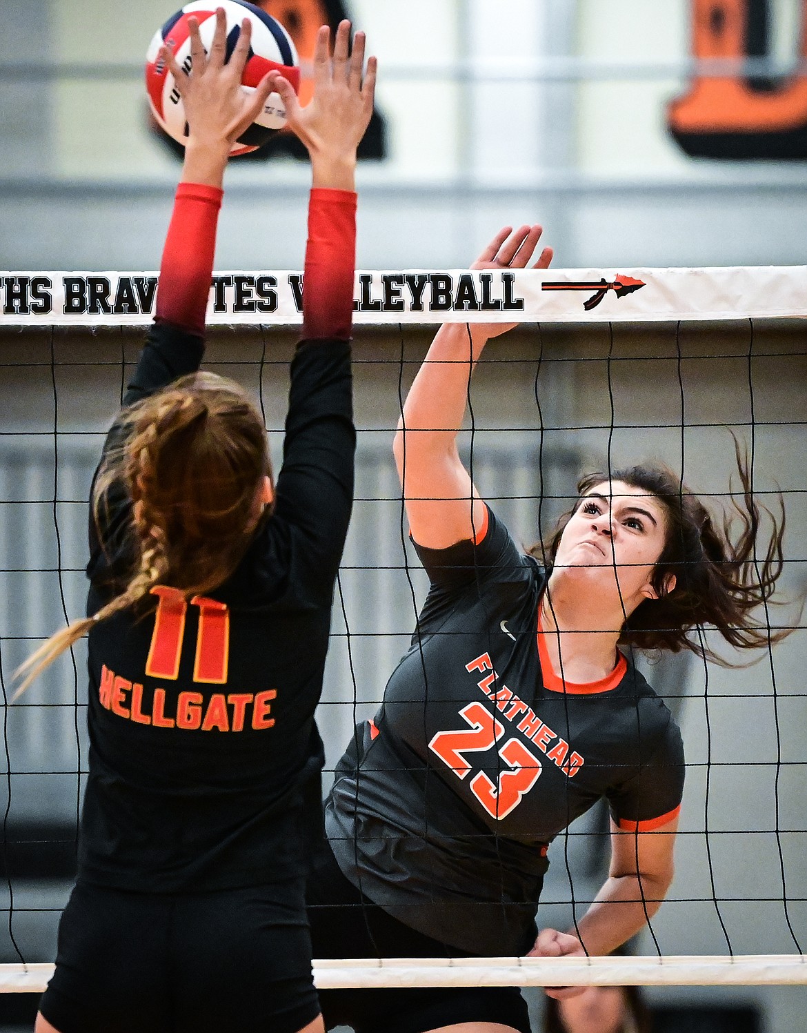 Flathead's Savanna Sterck (23) goes up for a kill against Missoula Hellgate at Flathead High School on Thursday, Sept. 23. (Casey Kreider/Daily Inter Lake)